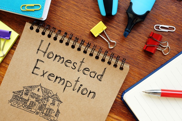 Homestead Exemption is shown on a business photo using the text.