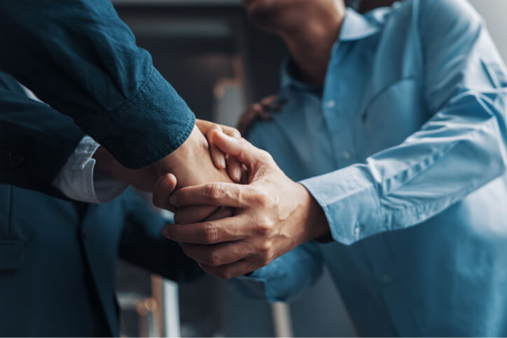 Two people shaking hands